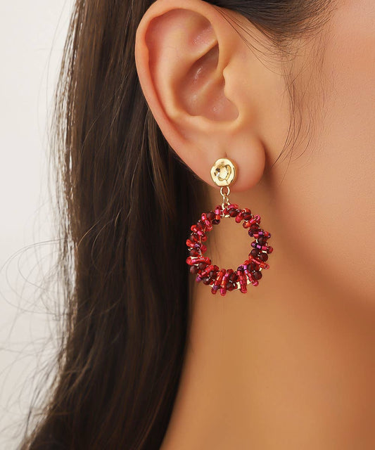 Red stud earrings